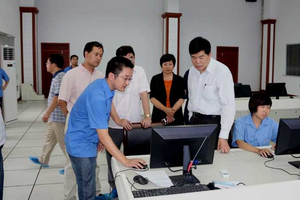 国务院参事胡本钢来mg冰球突破电缆举行“核电走出去”调研